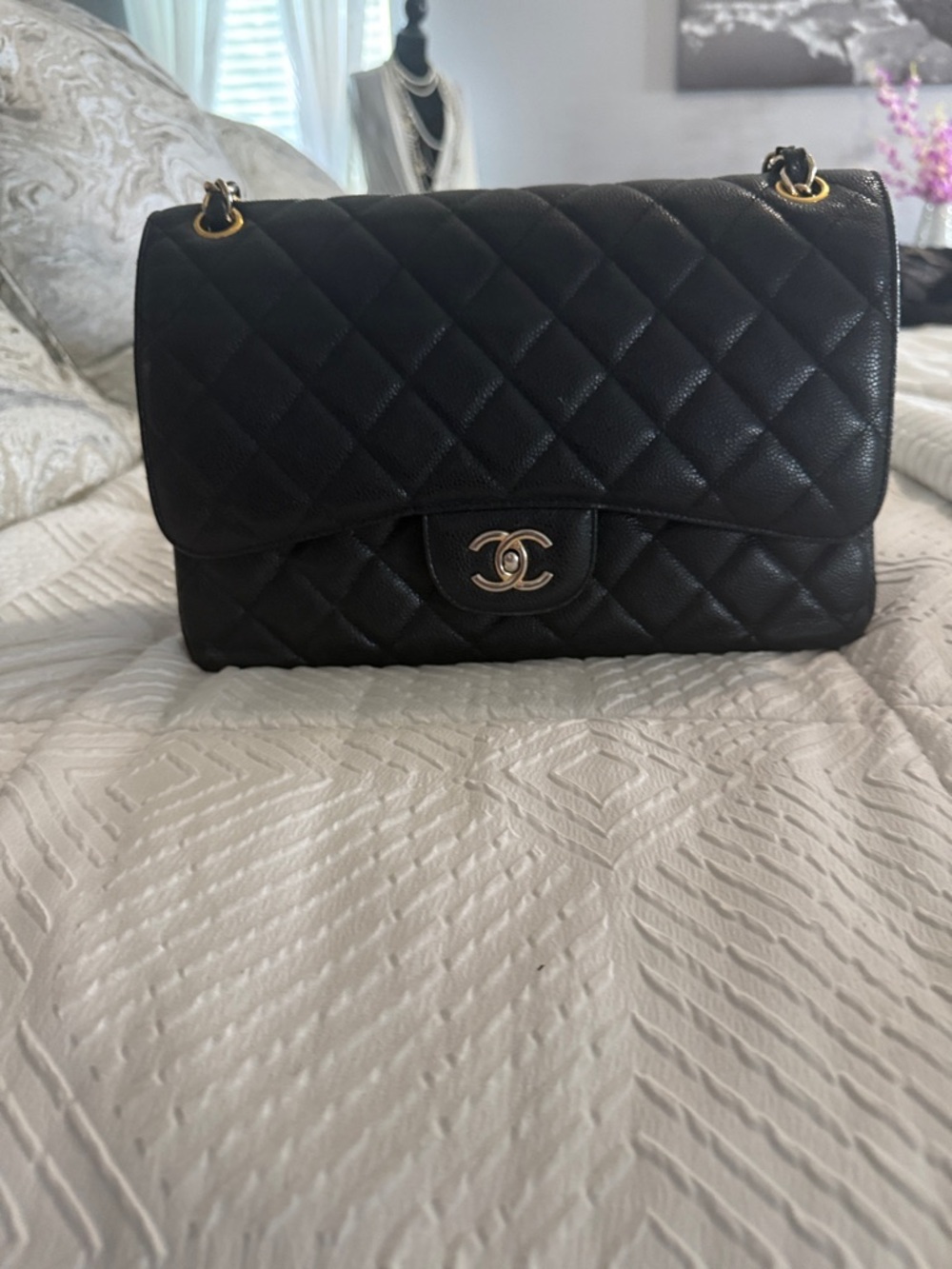 CHANEL Black Quilted Shoulder Bag with Gold Hardware